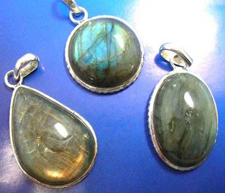  sterling silver pendant with assorted geometrical design labodorite seashell inlaid, around edge, assorted design randomly pick